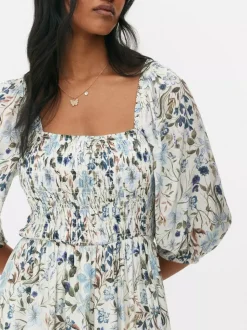 Marszczona sukienka midi z bufiastymi rękawami