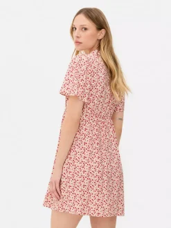 Minisukienka popołudniowa z kołnierzykiem na guzik