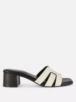 Pantofle bez pięty na słupku z plecionym paskiem