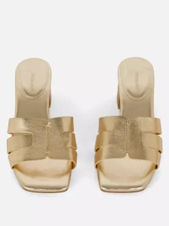 Pantofle mule na niskim obcasie klockowym