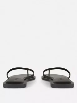 Płaskie sandały-japonki ze zdobieniem przy palcach