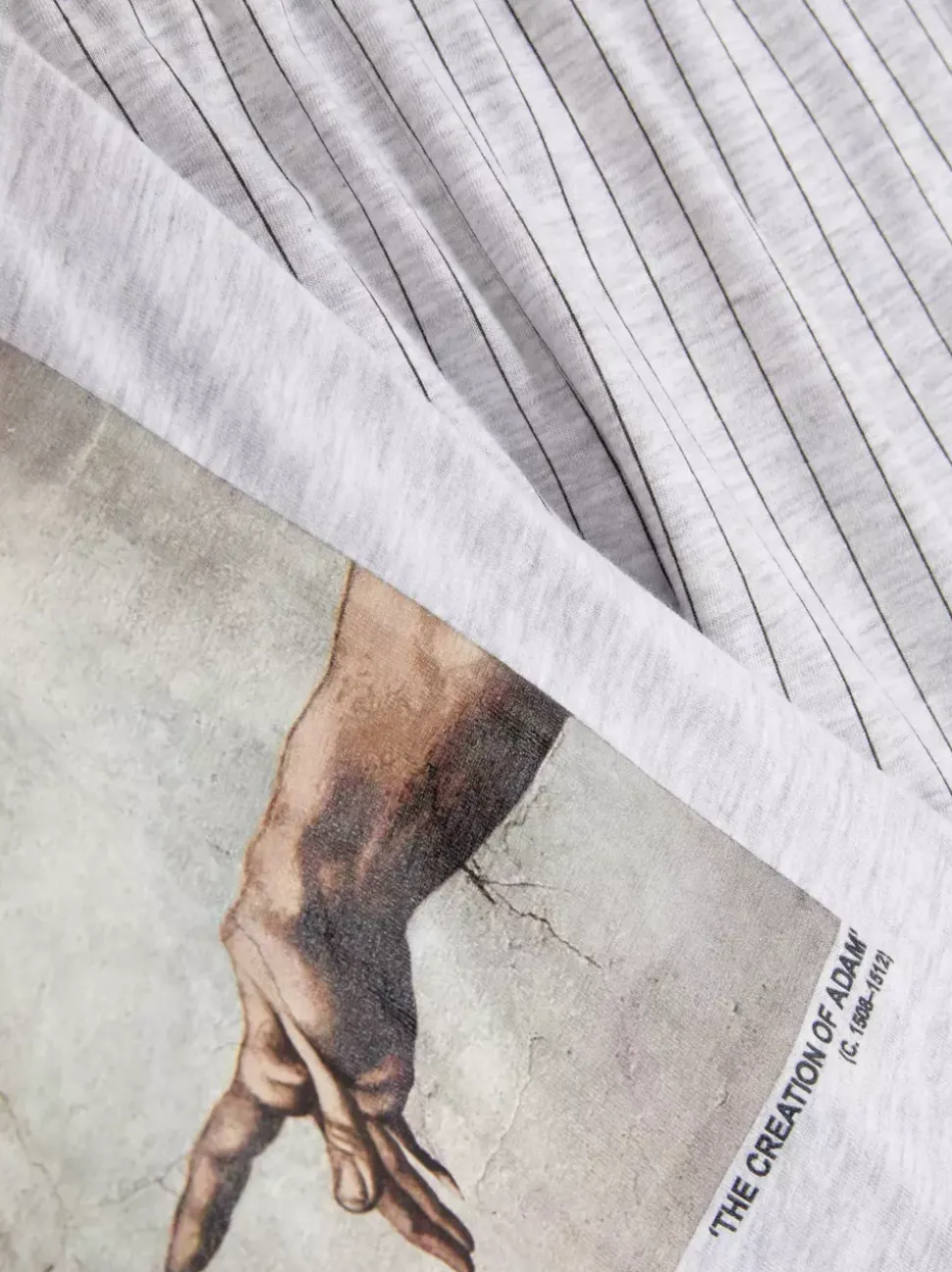 Piżama z motywem „Stworzenia Adama” Michała Anioła