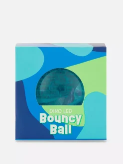 Piłka kauczukowa LED z dinozaurem