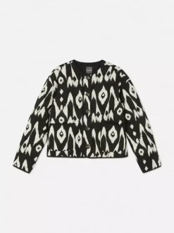 Pikowana kurtka z zapięciem na guziki