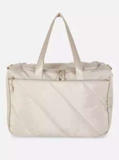 Pikowana torba kabinowa mieszcząca się pod fotelem