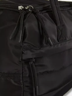 Pikowana torba kabinowa mieszcząca się pod fotelem