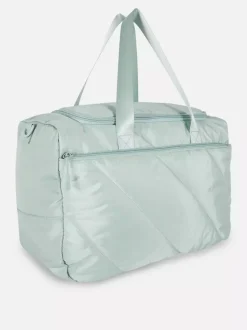 Pikowana torba kabinowa mieszcząca się pod fotelem