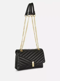 Pikowana torba na ramię z łańcuszkiem i klapą