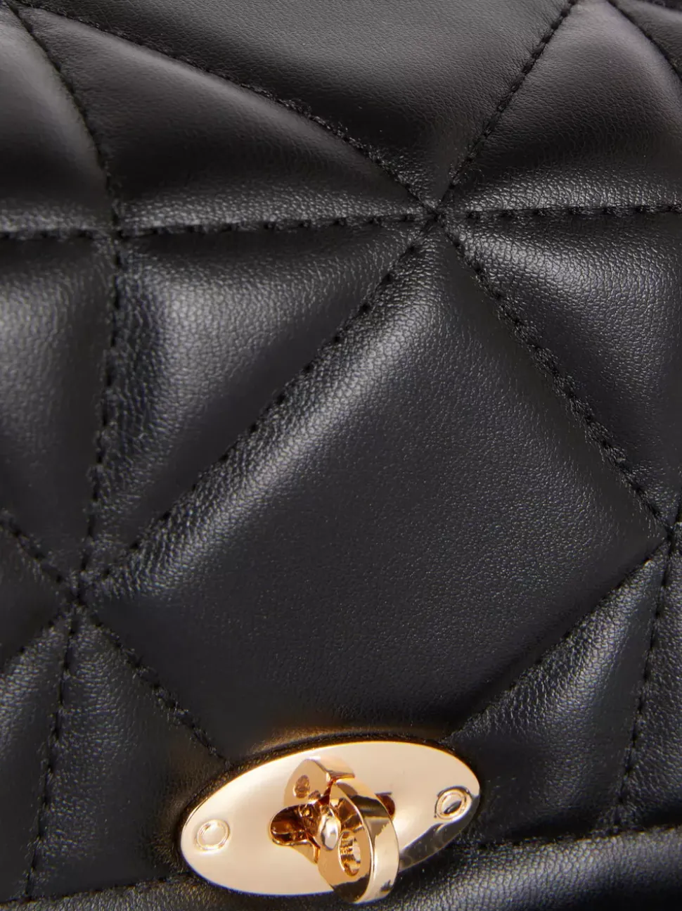 Pikowana torba na ramię z obracaną klamrą