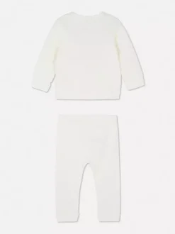 Pikowany komplet z topem i spodniami z aplikacją