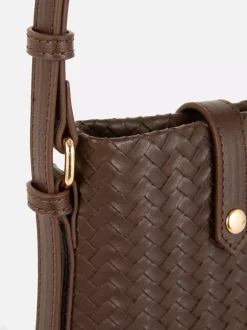 Pleciona minitorebka na telefon ze sztucznej skóry