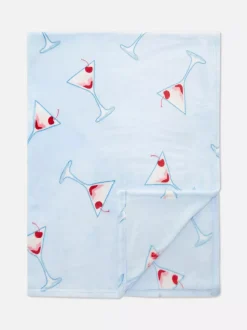 Pluszowa narzuta z motywem Martini