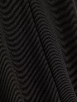 Prążkowane spodnie z rozszerzaną nogawką