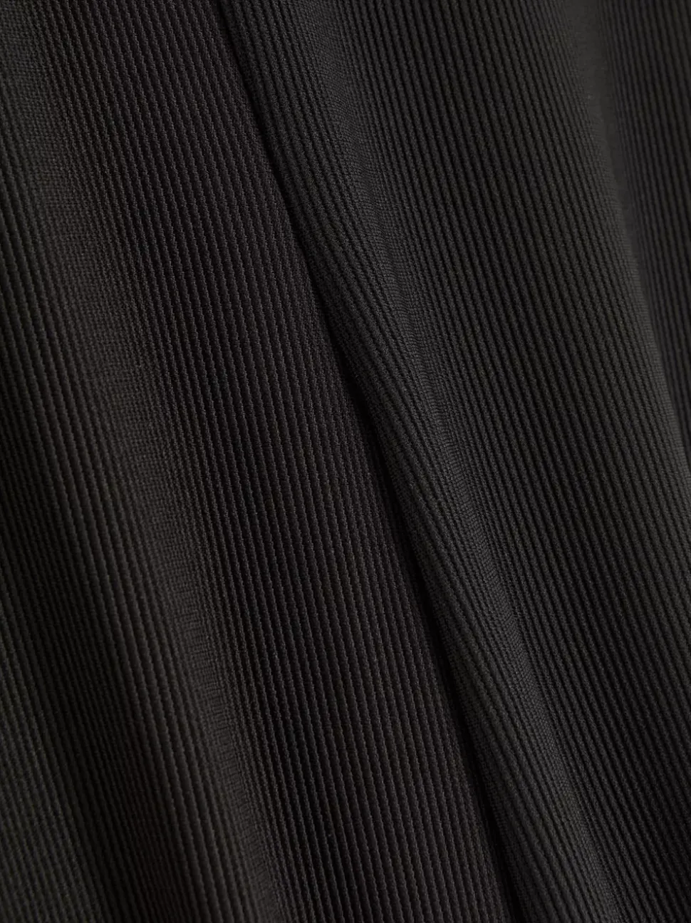 Prążkowane spodnie z rozszerzaną nogawką