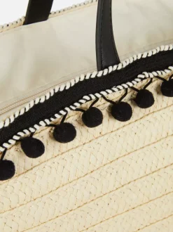 Słomkowa torba typu bucket z pomponikami