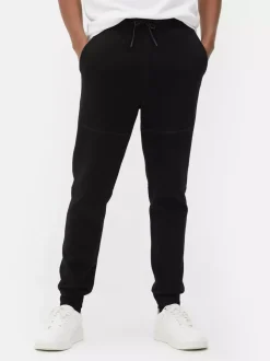 Spodnie dresowe ze sznurkiem i ściąganymi nogawkami