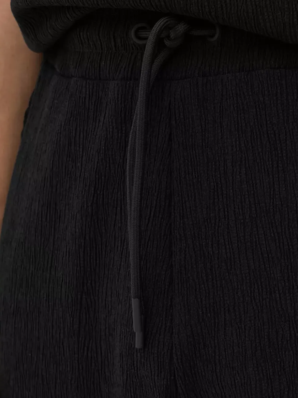 Spodnie o marszczonej fakturze ze sznurkiem Kem