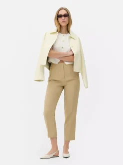 Spodnie w prążki z wysokim stanem i motywem Sticha