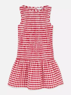 Sukienka w kratkę z marszczeniami i niskim stanem