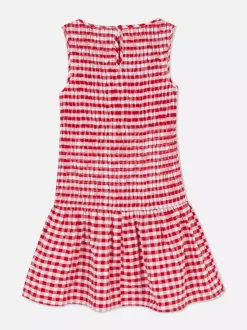 Sukienka w kratkę z marszczeniami i niskim stanem