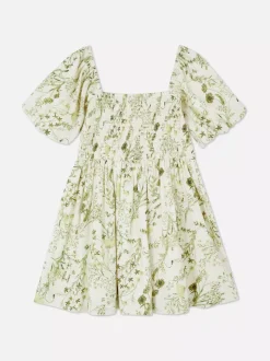 Sukienka w kwiaty z bufiastymi rękawami