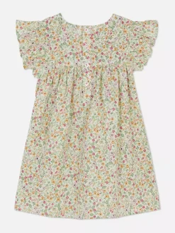 Sukienka z falbanką w drobne kwiaty