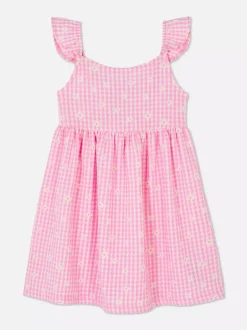 Sukienka z falbanką w kratkę vichy z motywem kwiatów