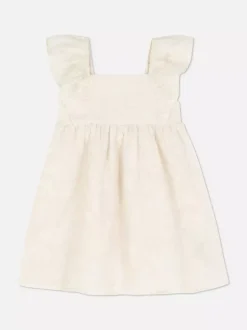 Sukienka z haftem i falbankami