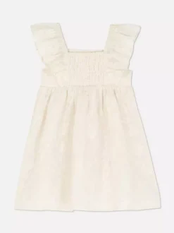 Sukienka z haftem i falbankami