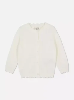 Sweter rozpinany z muszelkowym obszyciem