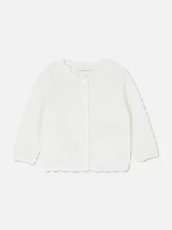 Sweter rozpinany z muszelkowym wykończeniem