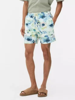 Szorty kąpielowe ze sznurkiem w akwarelowe kwiaty