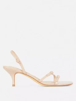 Szpilki z tylnym paskiem i obcasem typu kaczuszka