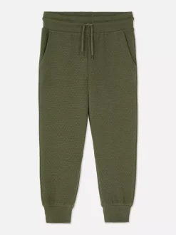 Teksturowane spodnie dresowe ściągane sznurkiem