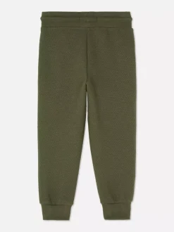 Teksturowane spodnie dresowe ściągane sznurkiem