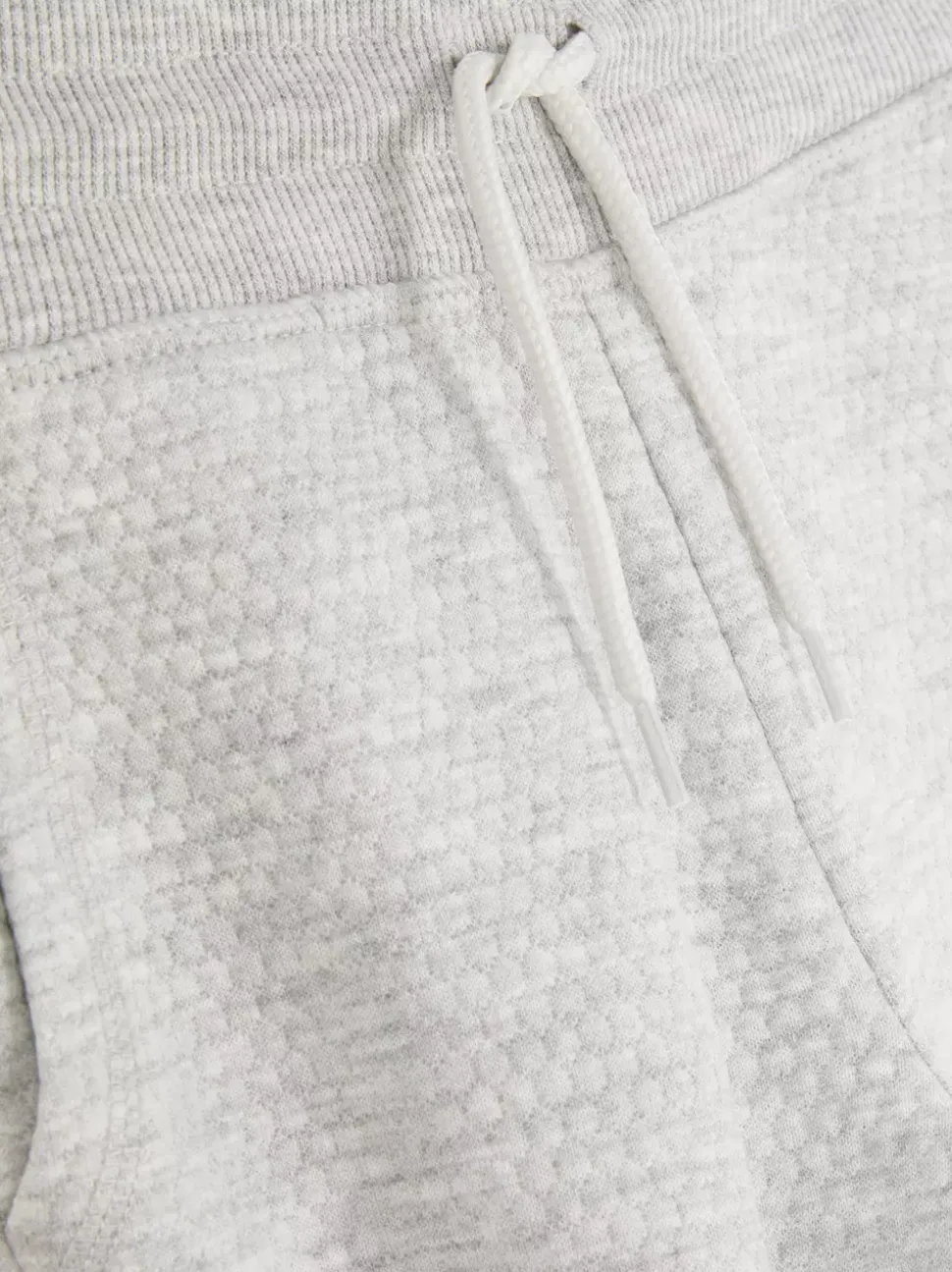 Teksturowane spodnie dresowe ściągane sznurkiem