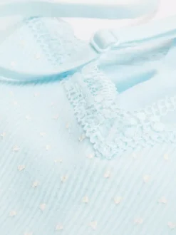 Top na ramiączkach z koronkowym obszyciem