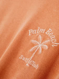 T-shirt z haftem i efektem sprania