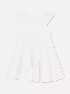 Warstwowa sukienka z haftem