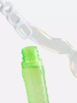 Wiatraczek na bańki mydlane z motywem dinozaura