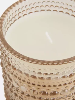 Świeca w szkle o bąbelkowej powierzchni