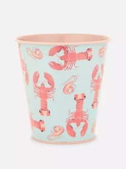 Świeca wotywna w metalowym pojemniku