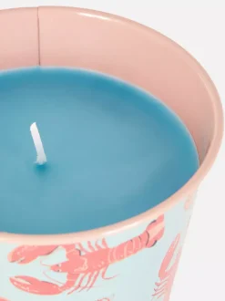 Świeca wotywna w metalowym pojemniku