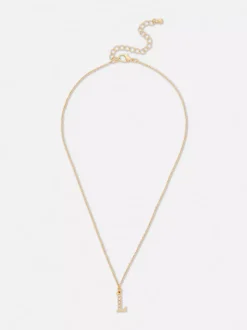 Wisiorek z inicjałem ze strasami