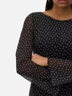 Wzorzysta siateczkowa sukienka mini z dżerseju