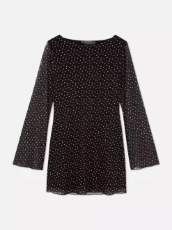 Wzorzysta siateczkowa sukienka mini z dżerseju