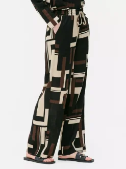 Wzorzyste spodnie ze ściąganym sznurkiem