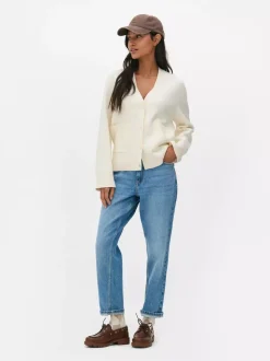 Zapinany na guziki sweter rozpinany z dekoltem w serek