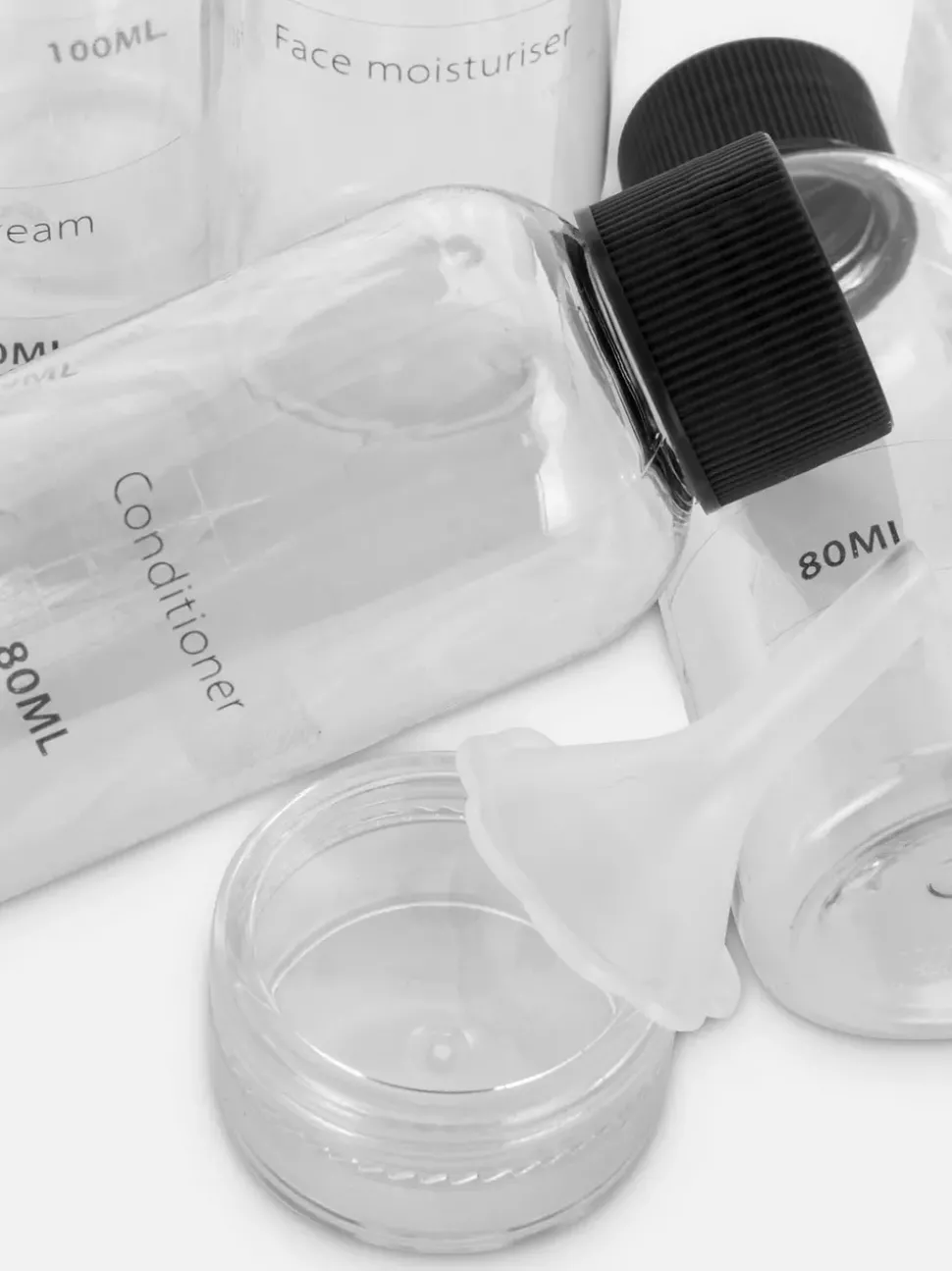 Zestaw buteleczek podróżnych i etykietek