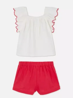 Zestaw z szydełkową bluzką i szortami